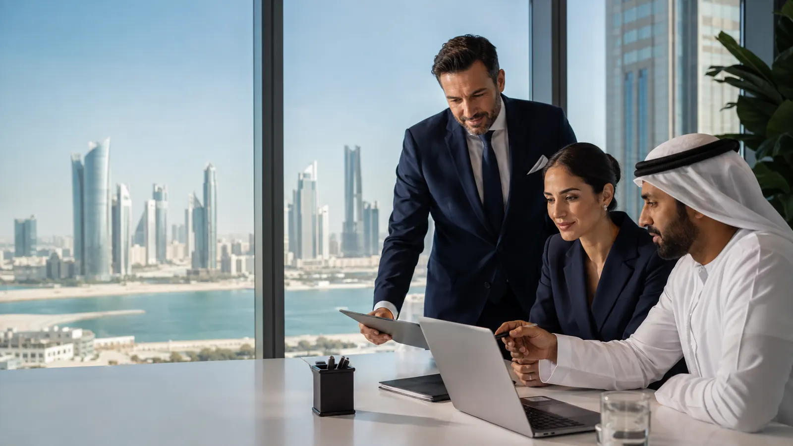 UAE business team reviewing digital customer demand in a modern Gulf office